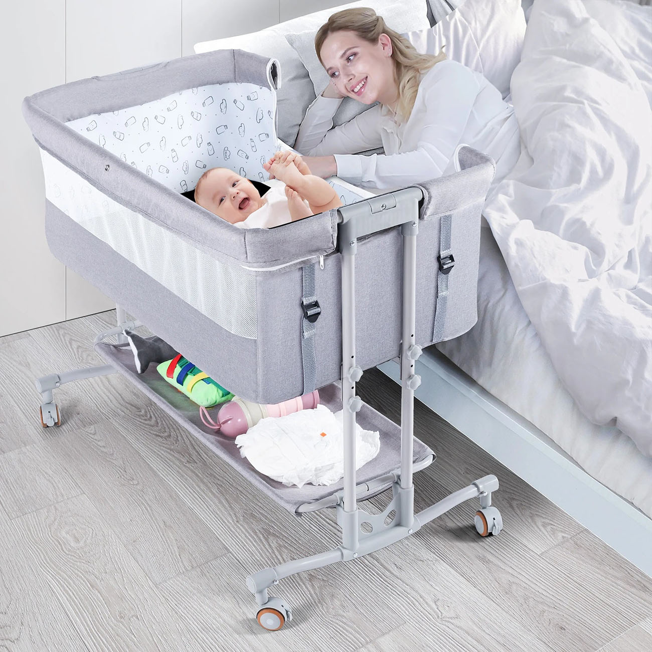 portable baby bassinet-portable bassinet-rocking bassinet-Baby sleeping comfortably in bassinet-light gray